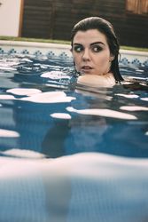 Woman looking back in pool