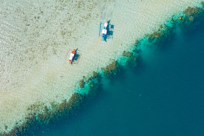 Aerial view of boats on shallow