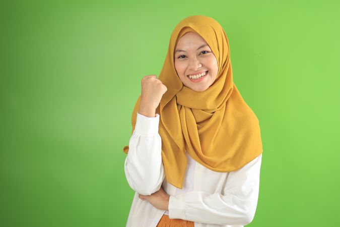 Young Asian Muslim Doing Winning Gesture Celebrating Fist Saying Yes
