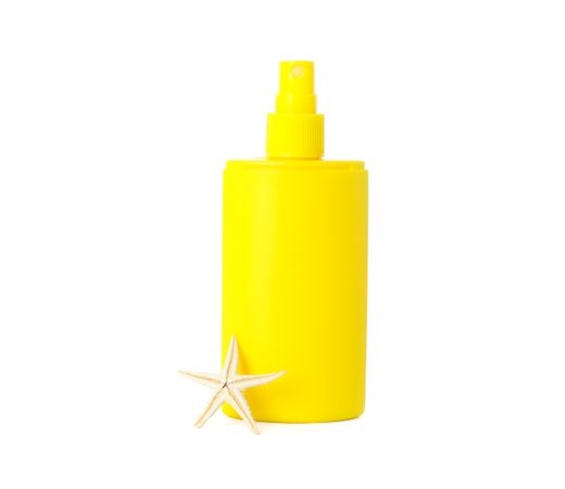 Sunscreen spray with starfish isolated on plain background. Summer vacation accessories