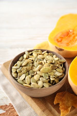 Concept of Autumn vibe food, Pumpkin, Pumpkin seeds, space for text