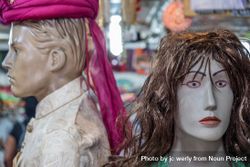 Close up of two mannequin heads beMDGb