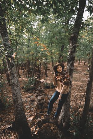 Young woman relaxing in forest