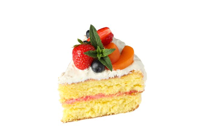 Piece of berry cream cake isolated on plain background