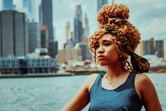 Close up portrait of young Black woman with Hudson River in the background, copy space