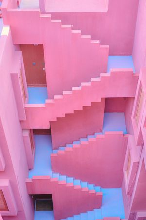 Modern pink building with blue stairs