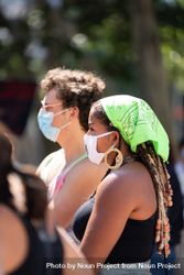 Los Angeles, CA, USA — June 16th, 2020: two people listening to speakers at protest demonstration 5r9VZ0