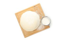 Board with dough and flour isolated on blank background