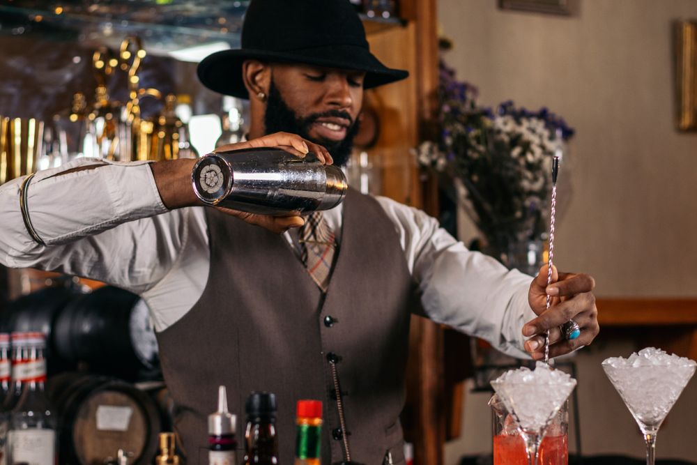 The magic of mix: a bartender preparing his best creations