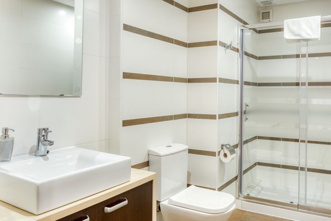 Interior of bathroom with shower cabin