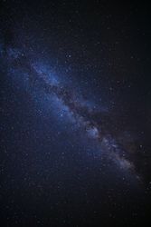 milky way galaxy and space dust in the universe, Long exposure photograph, with grain.