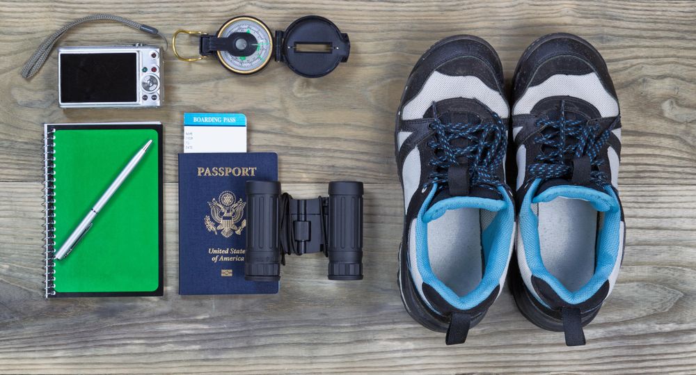 Travel gear on wooden boards