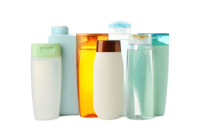Blank bottles for cosmetics isolated on light background