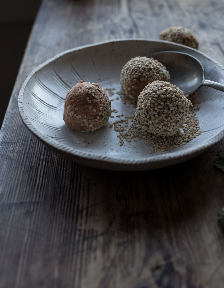 Set of sweet potatoes in sesame seeds on plate