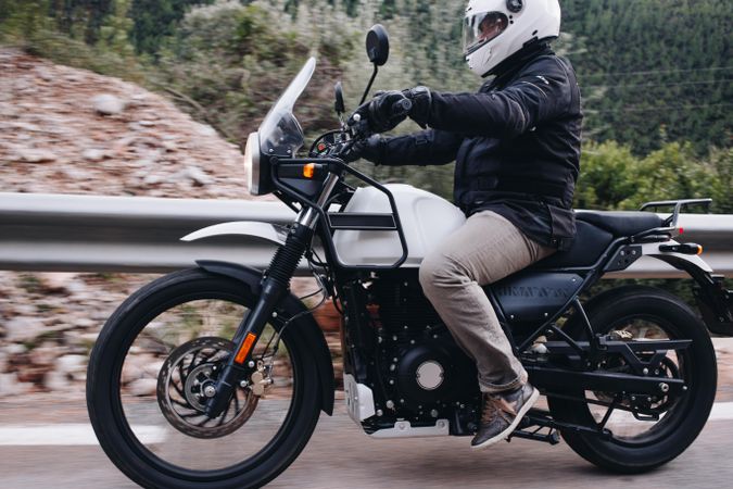 Action shot of man on motorcycle bike on highway