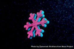 Snowflake in vivid neon colors on dark  background 5kpzW4