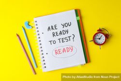 Open notebook with “are you ready to test” on yellow table 5qJrw4
