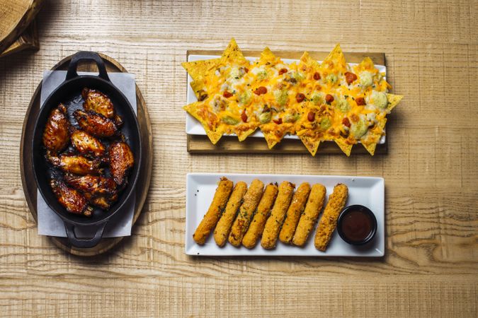 Roasted meat chicken fillet in batter and cheese nachos