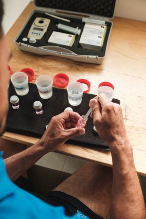 Veterinarian preparing medicine for animals