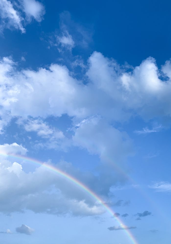 Half of a rainbow in the sky