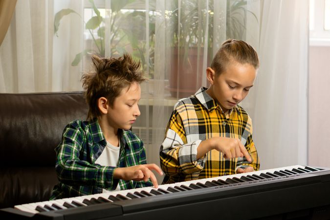 Brothers Sharing Piano Moments