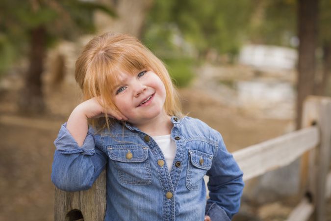 Cute Young Girl Posing for a Portrait Outside