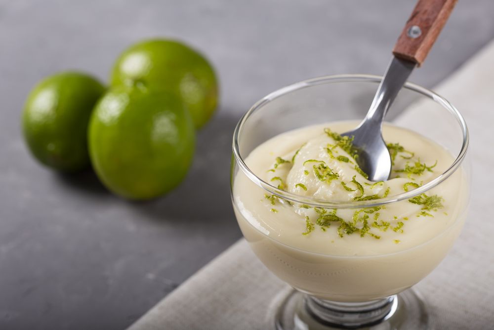 Lemon mousse with lemon zest on top.