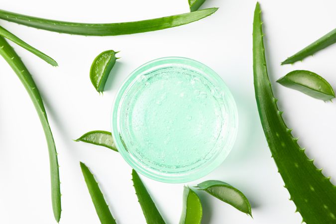 Composition with natural treatment accessories on plain background, closeup. Aloe vera
