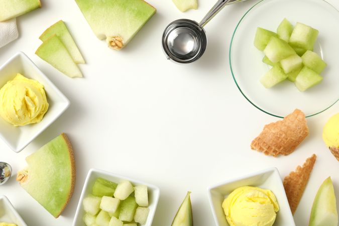 Ice cream scoops with slices of fresh melon