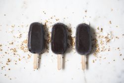 Three chocolate popsicles