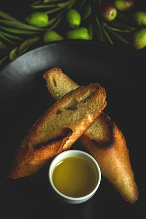 Fresh Spanish extra virgin olive oil with olives