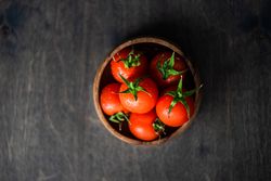 Top view of bowl of fresh tomatoes