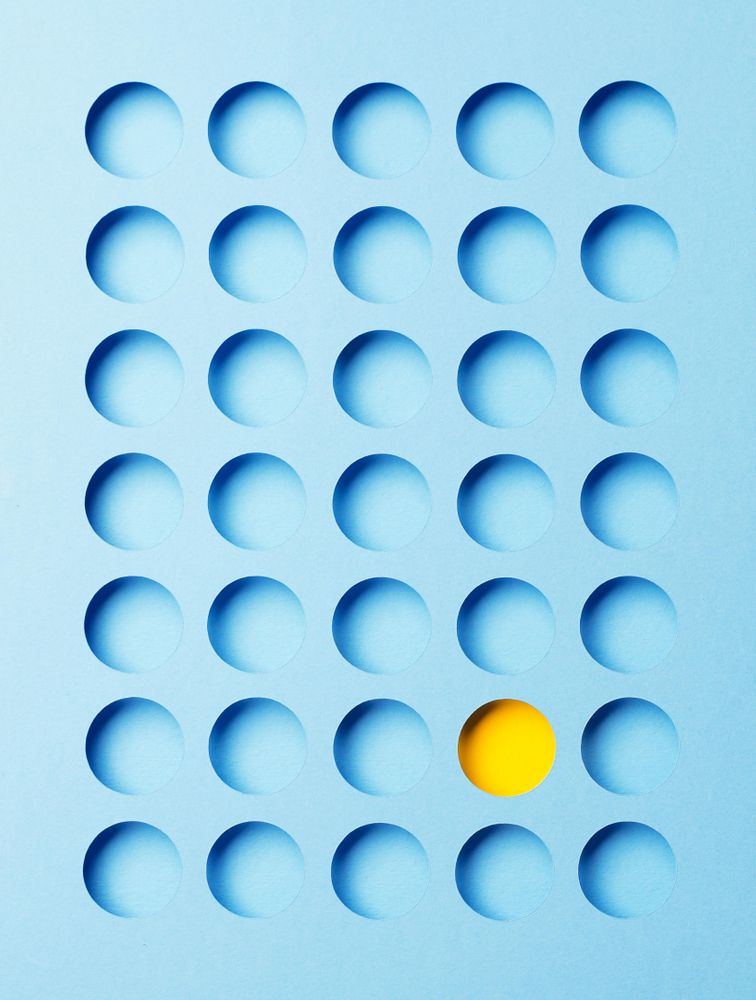 Circle pattern cut out with yellow and blue