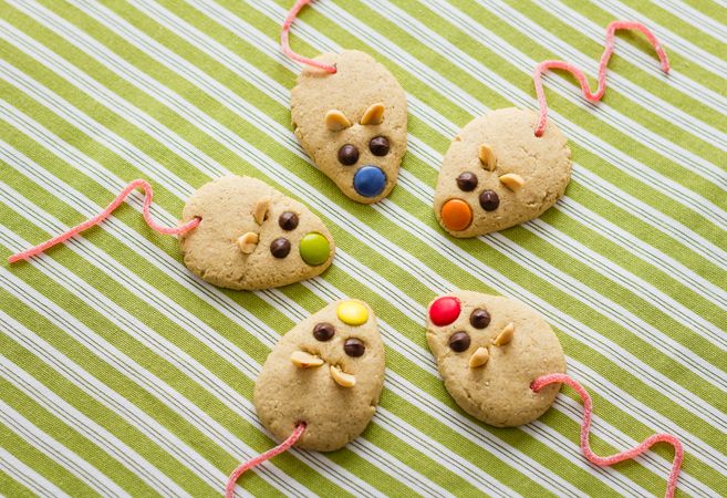 Cookies with mouse shaped and red licorice tail
