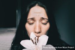 Portrait of woman with lily flower 4MkME0