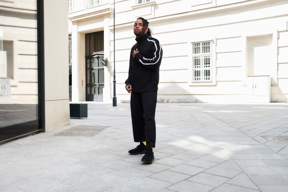 Black male standing on the street