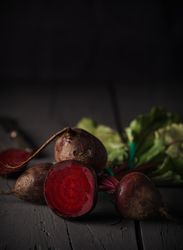 Bunch of raw beetroot with edible taproots and leaves