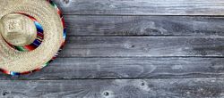 Cinco de mayo with sombrero on old wood