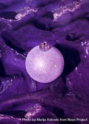 Christmas bauble decoration on purple cloth 5pdO85