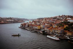 PORTO, PORTUGAL - February, 11, 2019 : Vessels floating near old city