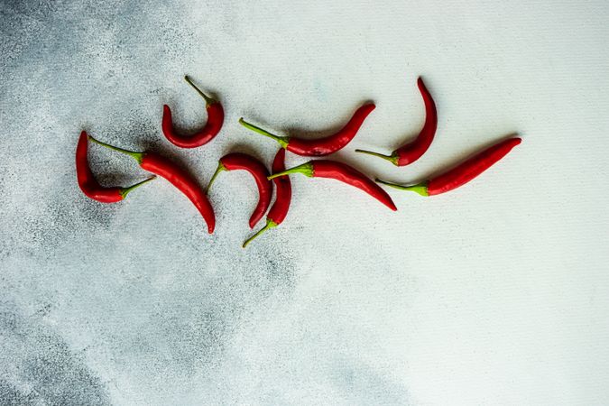 Red hot chilli pepper on marble kitchen counter