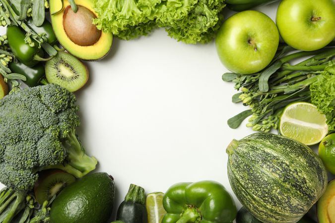 Vegetables and fruits on blank background, space for text
