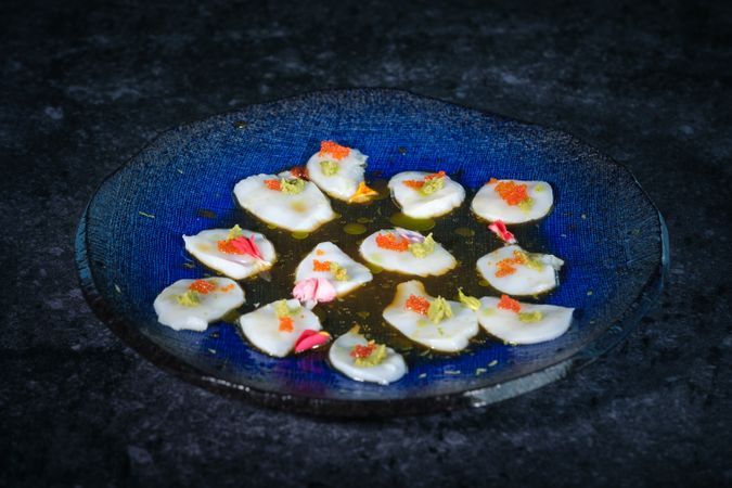 Scallop snacks served on plate