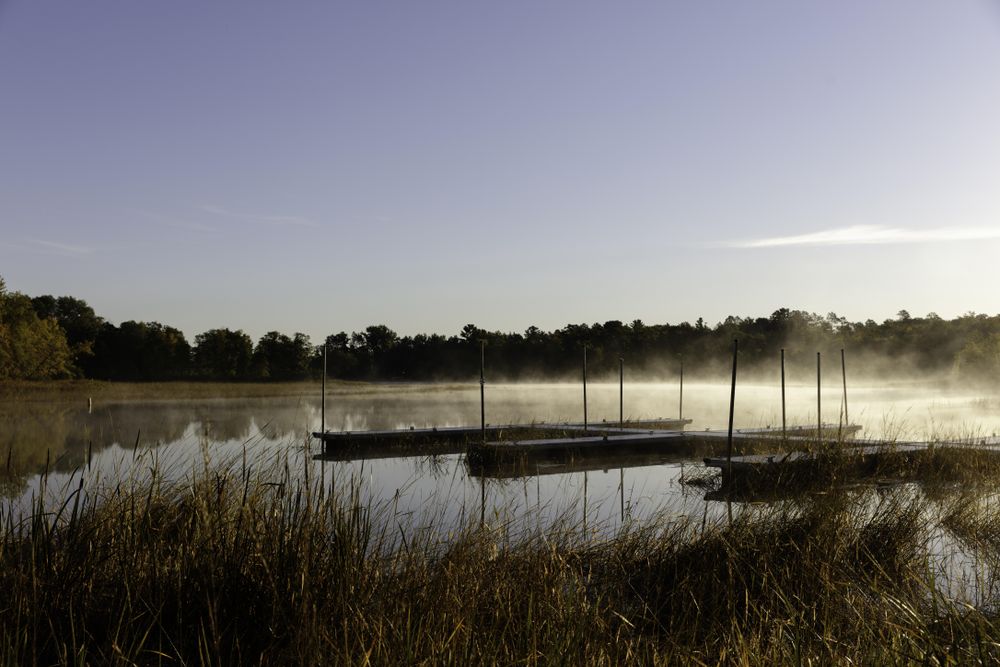Fog and docks on Big Sandy Lake in McGregor, Minnesota