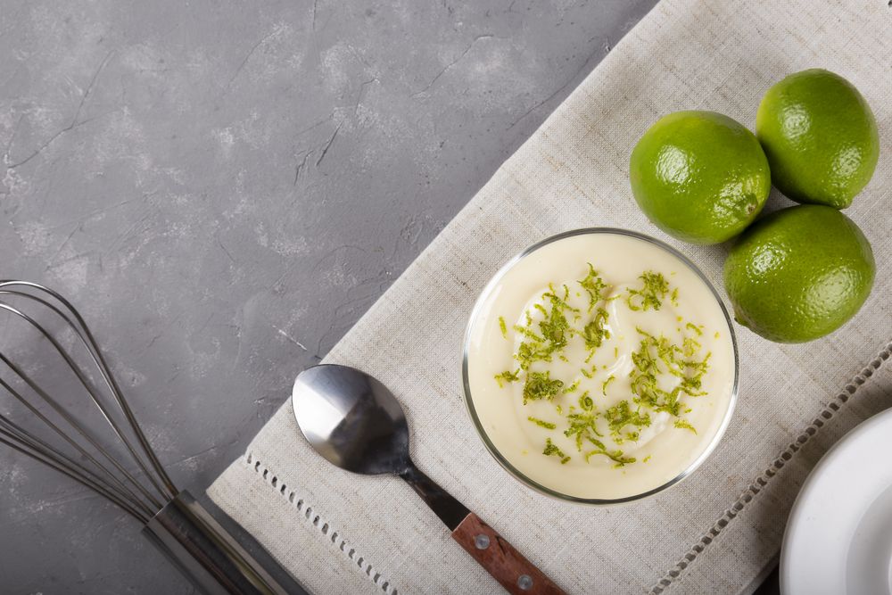 Lemon mousse with lemon zest on top.
