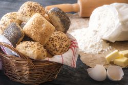 Basket with mixed buns and ingredients