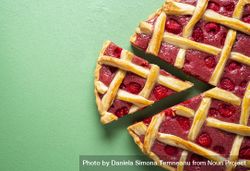 Raspberry pie with one slice and lattice crust. Classic dessert 5rEQd0