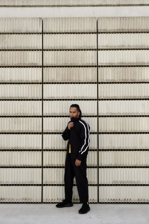 Black male near concrete blocks