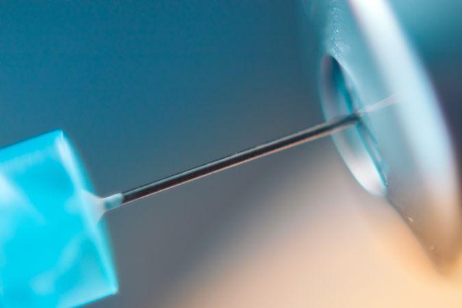 macro medical syringe with a vaccine. Concept vaccination