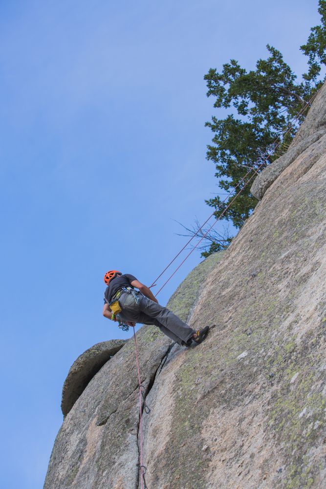 Man climbing a rock